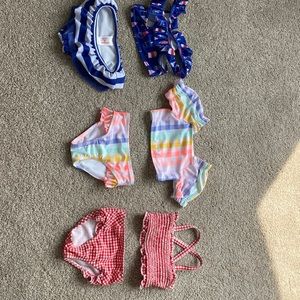 3 bathing suits. All size 18 months